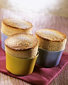 Banana and rum soufflés with icing sugar