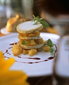 Tower of mature goat's cheese and preserved quinces