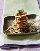 Spicy salmon tartare with rice crackers