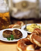 Rissoles, pretzels and potato salad