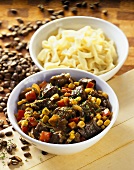 Beef goulash with sweetcorn and peppers, coffee noodles