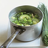 Green vegetable soup with chicken and chives