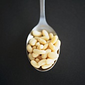White beans on spoon