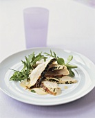 Chicken breast with herbs and salad garnish