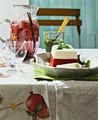 Tomato terrine with basil sauce and berry punch with vanilla