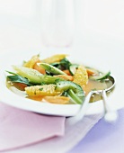 Vegetable soup with orange segments