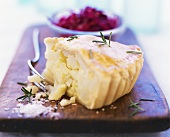Piece of potato pie with rosemary for picnic