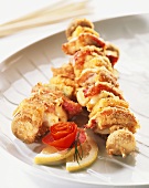 Breaded matje herring kebabs with cheese, bacon & mushrooms