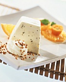 Frozen tea cream with orange and ginger whip