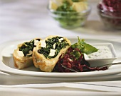 Sheep's cheese & spinach strudel with salad & yoghurt sauce