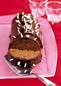Rehrücken cake (chocolate roll) with slivered almonds