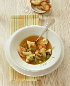 Bouillabaisse with fish and shrimps