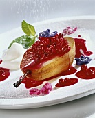 Poached pear with redcurrants
