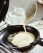 Making pancake with pancake maker