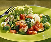 Broccoli and courgette salad with diced tomato