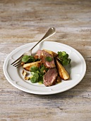 Duck breast with pears, watercress and walnuts