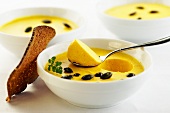 Pumpkin mousse with pumpkin seeds and toasted bread