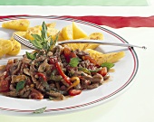 Spezzatino e polenta (Strips of veal with polenta)