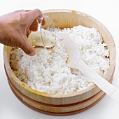 Making sushi rice (adding vinegar)