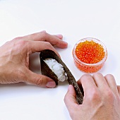 Making gunkan maki with caviar