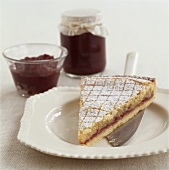 Piece of cranberry tart with cranberry jam