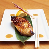 Cod fillet with miso paste on banana leaf (Japan)