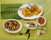 Potatoes with bay leaves, buckwheat polenta, semolina shapes