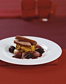 Duck breast with plums and curried rice
