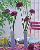 Ornamental onions in blue vases decorated with strings of beads