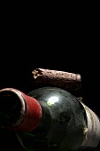 Old red wine bottle with cork