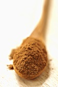 A spoonful of ground cinnamon