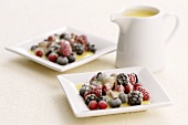 Frozen berries with white chocolate sauce