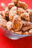 Assorted nuts for nibbling in glass bowl