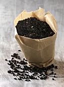 Black cumin in paper bag