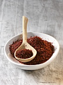 Sumac in bowl and on spoon