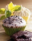 After Eight muffins with icing and chocolate sprinkles