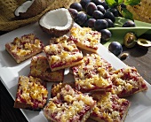 Plum and coconut cake, cut into pieces