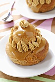 Profiteroles with coffee cream and icing