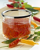 Hot chilli sauce in glass bowl