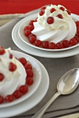 Meringues with cream and redcurrants