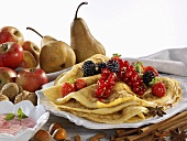 Pancakes, fresh fruit, spices and nuts