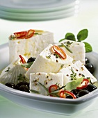 Marinated sheep's cheese with olives