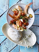 Oven-baked prawns with cherry tomatoes and bread