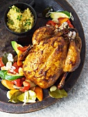 Corn-fed chicken with vegetables and couscous