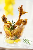 Roast chicken legs with rosemary and lemons