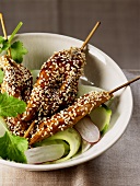Chicken skewers with sesame seeds