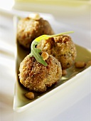 Chicken balls with pine nuts