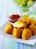 Breaded cheese cubes with cranberry jam