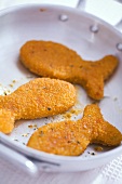 Deep-fried fish-shaped fish fillets
