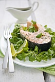 Salmon cutlet with orange vinaigrette and watercress